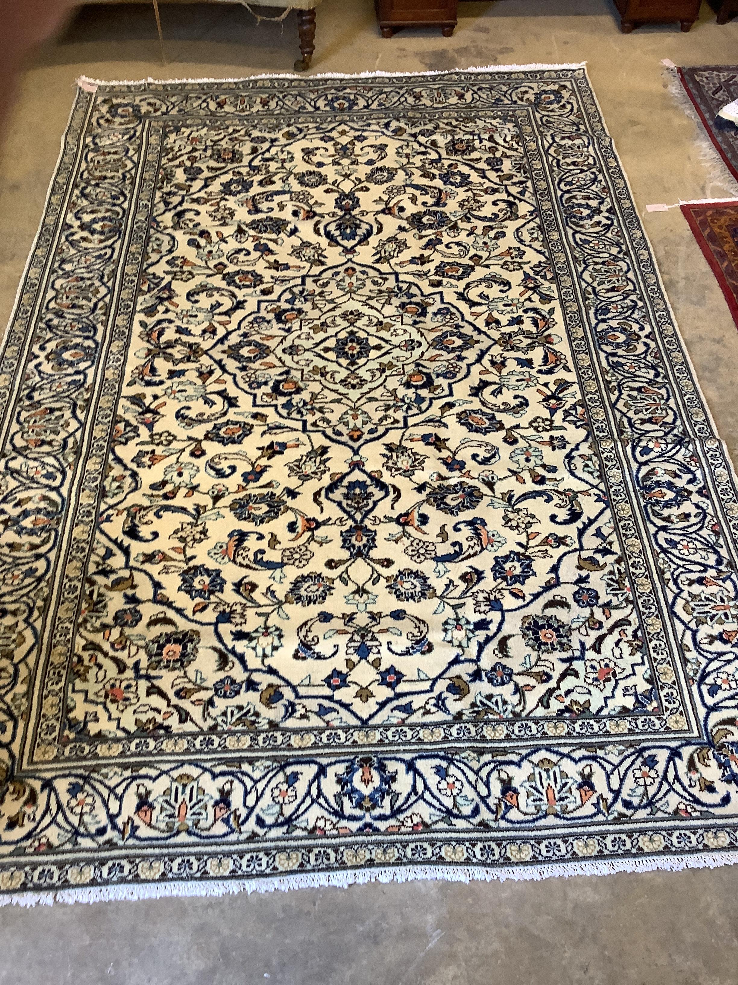 An Araan ivory ground carpet, 292 x 196cm